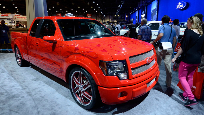 Illustration for article titled This Awesome F-150 With Flames On It Comes With A Matching Chopper Bicycle